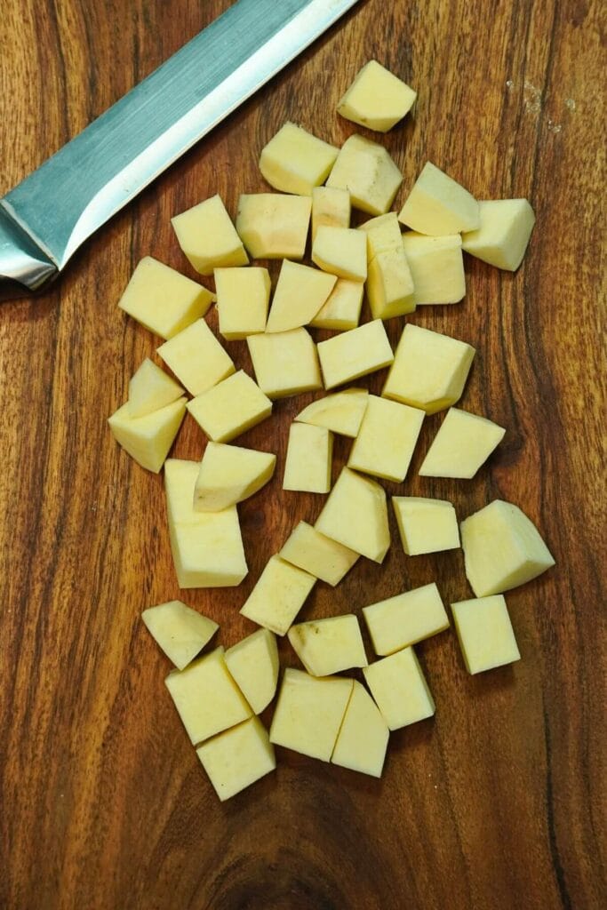 sweet potato diced in airfryer cutting
