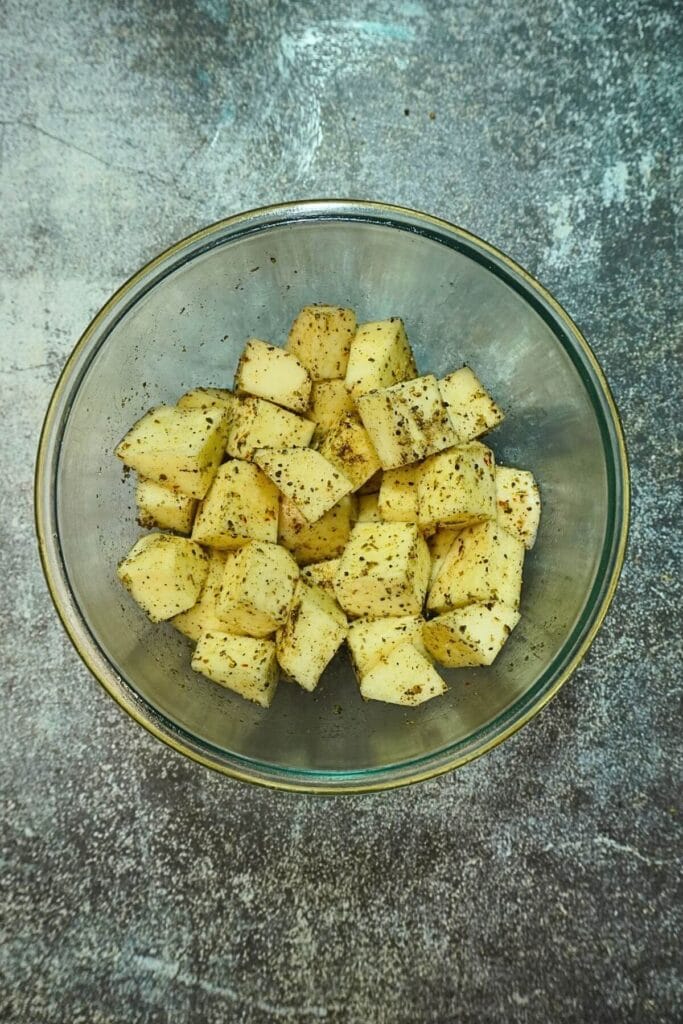 sweet potato diced in airfryer mix well