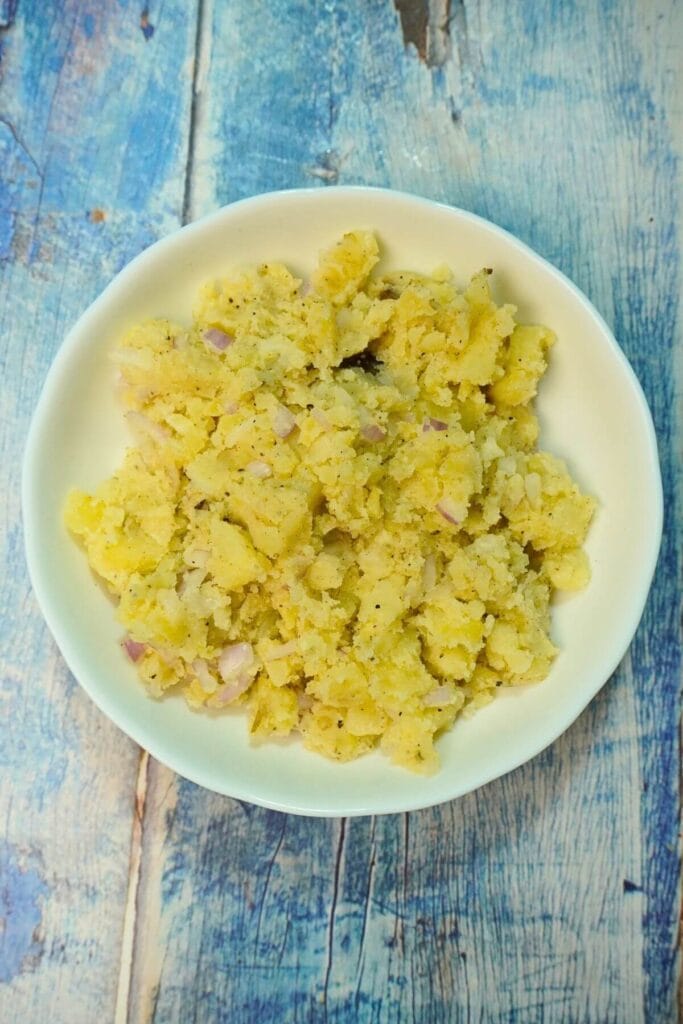 mashed potatoes in charcoal serving