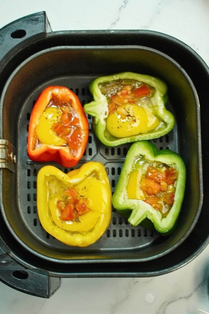 Air Fryer Egg Stuffed Bell Peppers add eggs