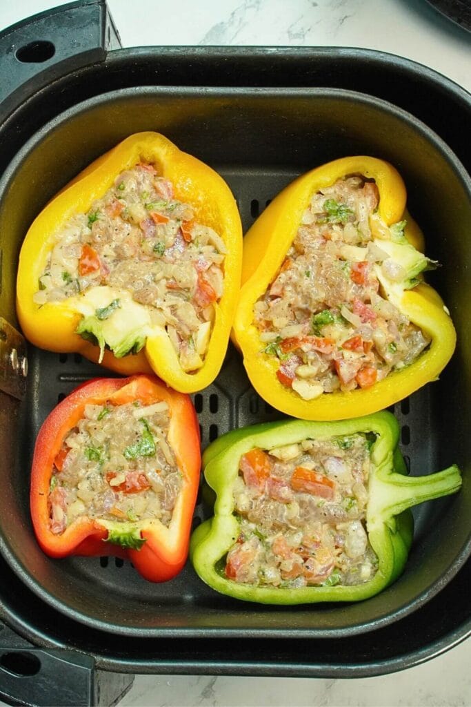 Air Fryer Stuffed Bell Peppers with Chicken add in basket