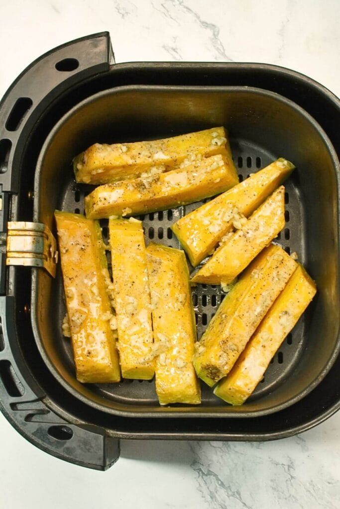 Garlic Air Fryer Roasted Pumpkin add in airfryer